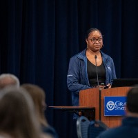 Presenter Shares Important Information to Audience